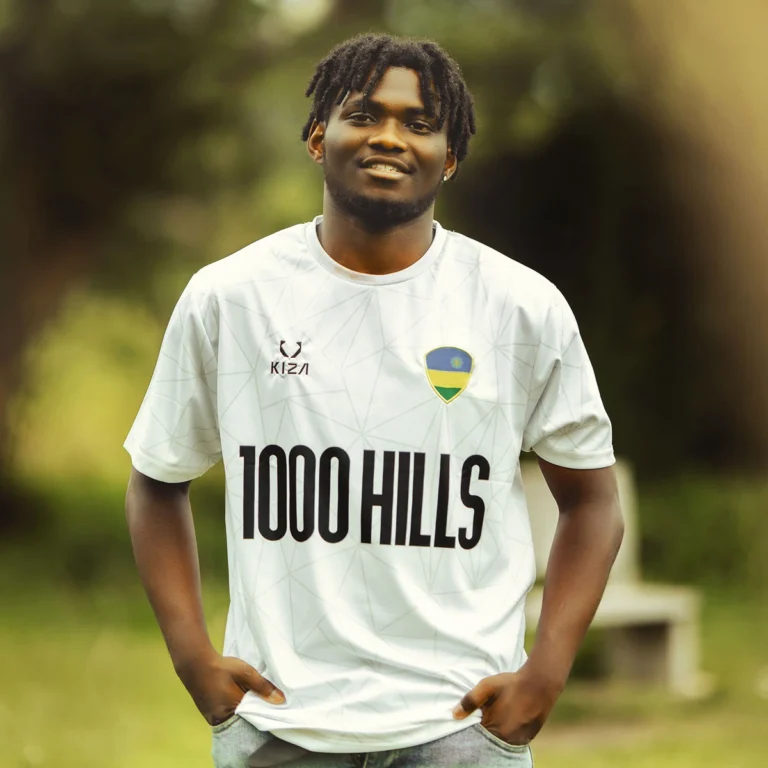 Man wearing the 1000 HILLS WHITE LINE jersey by KIZA with Rwanda patch