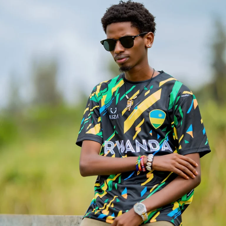 Man wearing Season 2 KIZA football jersey with bold Rwanda colors