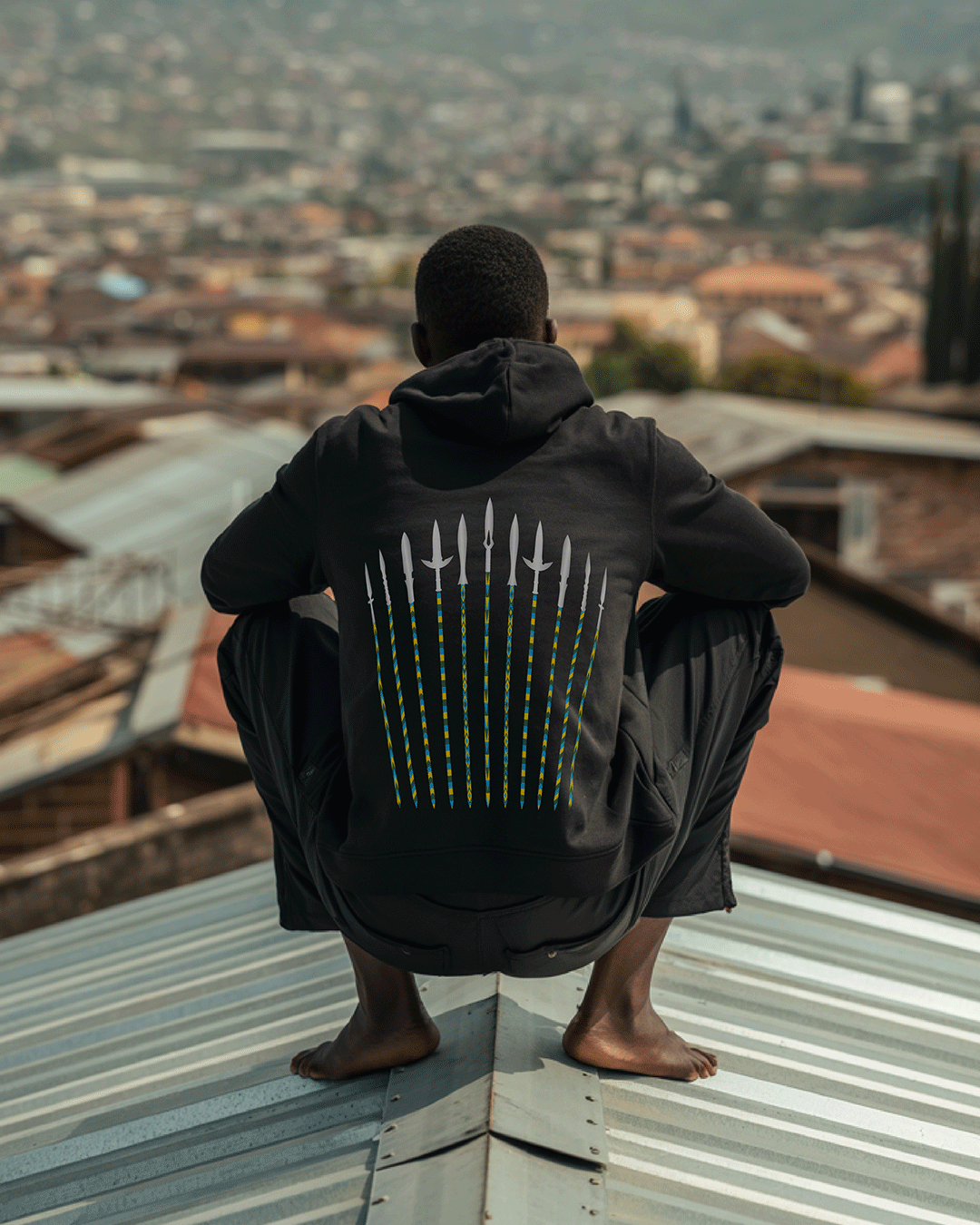 Model wearing KIZA Rwanda hoodie - authentic visit Rwanda jersey alternative